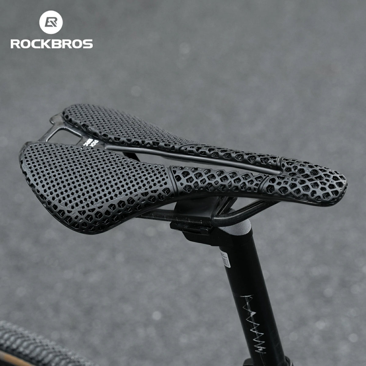 Bicycle saddle with textured design on a gray background, featuring the RockBros brand.