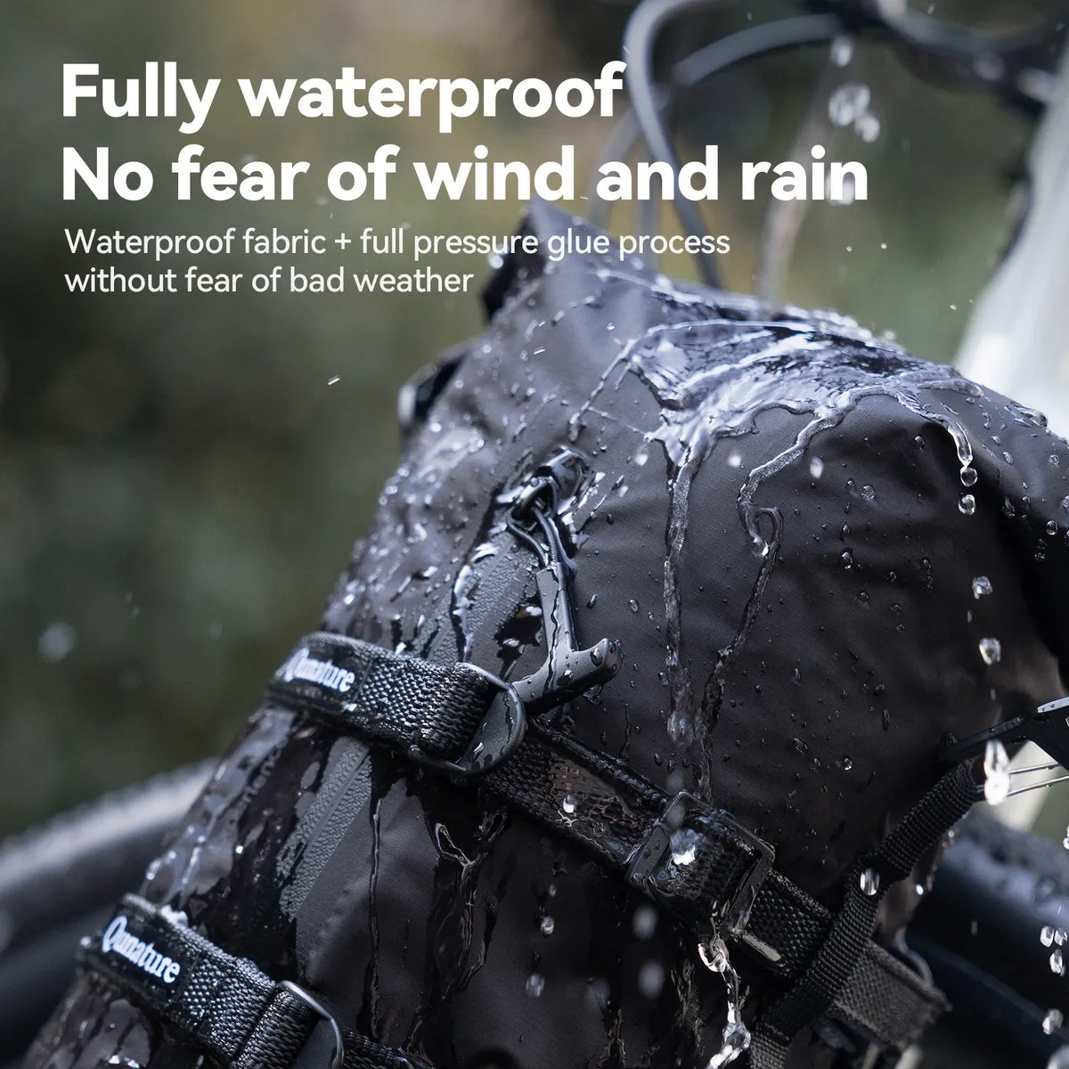 Black waterproof bag with water droplets on it, text indicating waterproof properties.