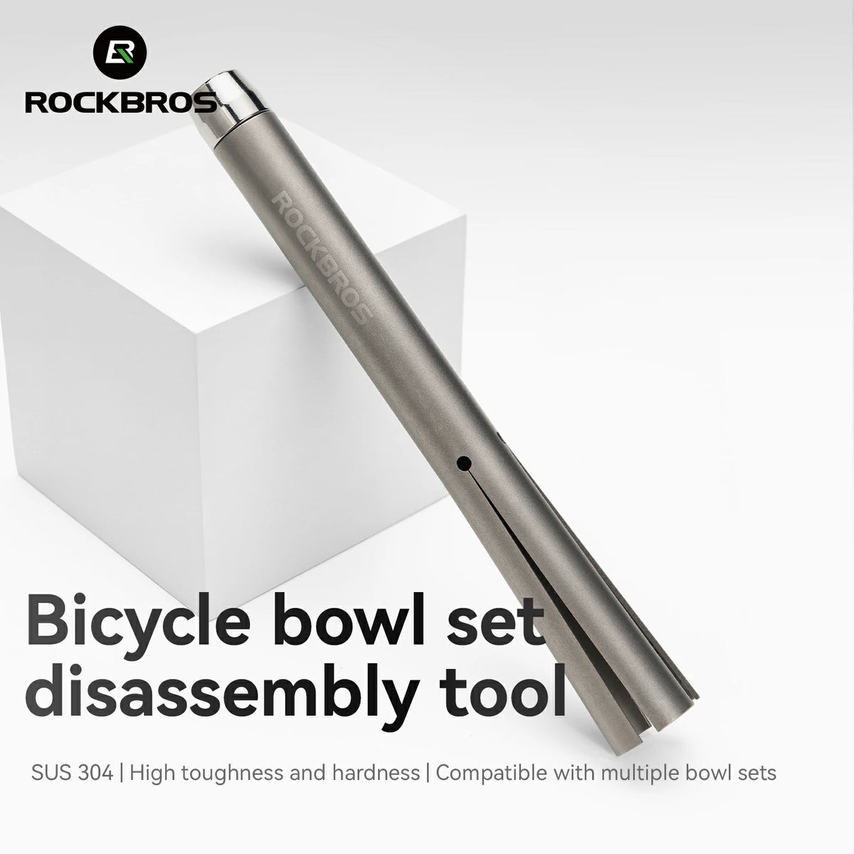 A metallic gray Rockbros bicycle bowl disassembly tool shown diagonally on a white display block, with the Rockbros logo and product text on a clean white background.