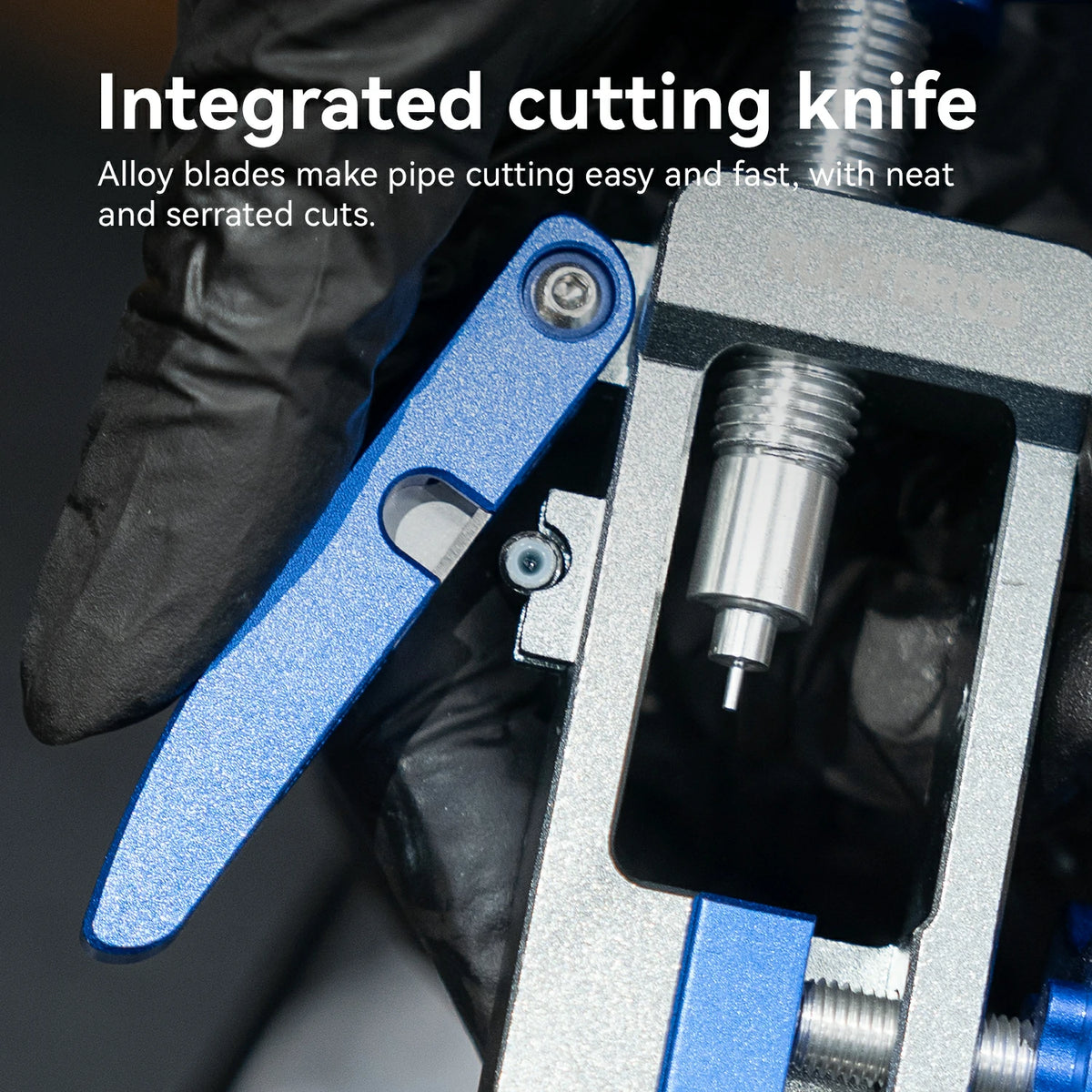 Close-up of a blue integrated cutting knife mechanism on a metal pipe cutting tool, with a gloved hand visible and text reading 'Integrated cutting knife.'.