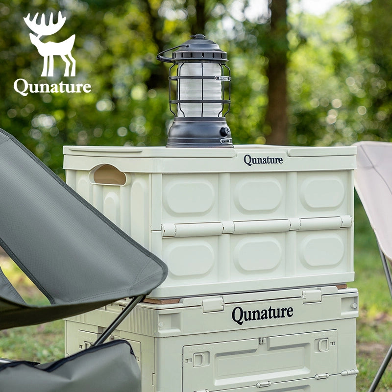 Qunature cooler with a lantern on top in an outdoor setting