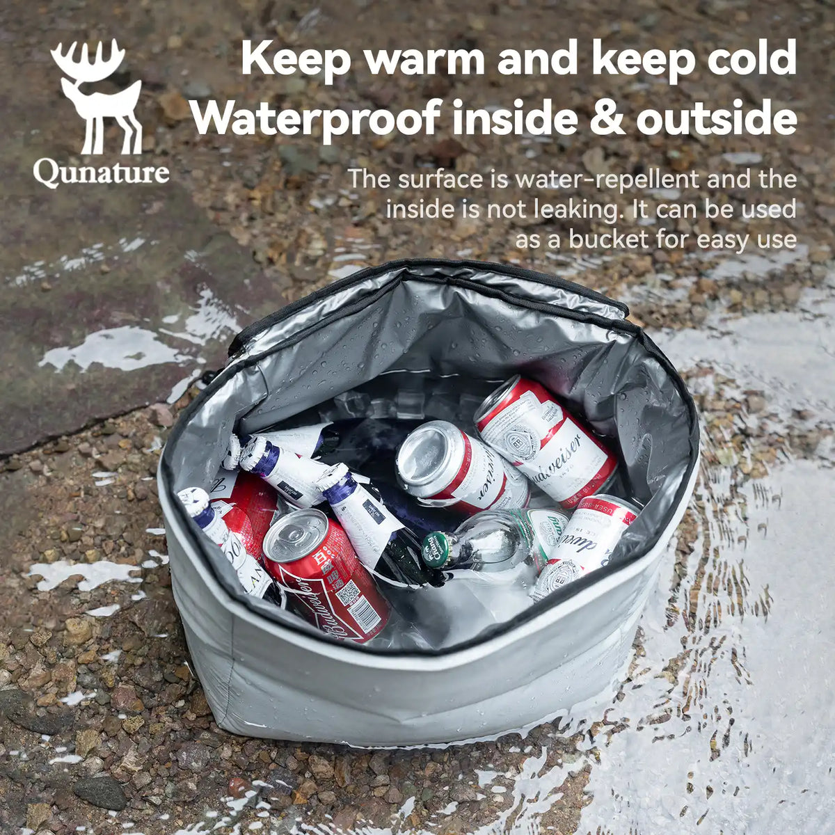 Insulated cooler bag with drinks on a wet pavement, featuring Qunature branding.
