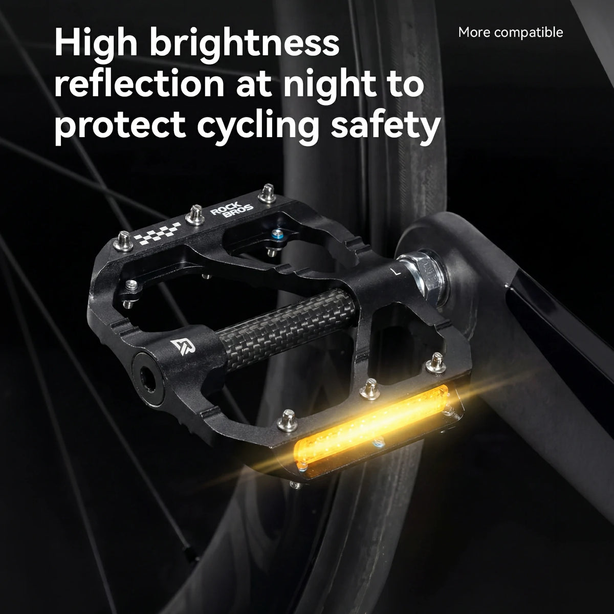 Black bicycle pedal with a textured black grip and a bright amber reflector, shown mounted on a dark bicycle wheel. White text at the top reads 'High brightness reflection at night to protect cycling safety' with 'More compatible' in the upper right.
