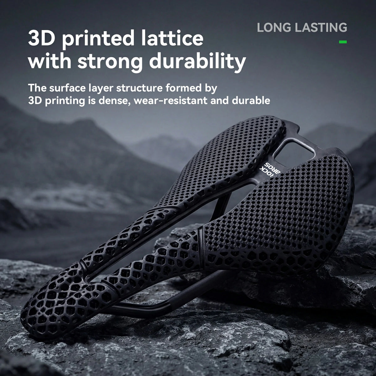 3D printed bicycle saddle on a rocky surface with mountainous background