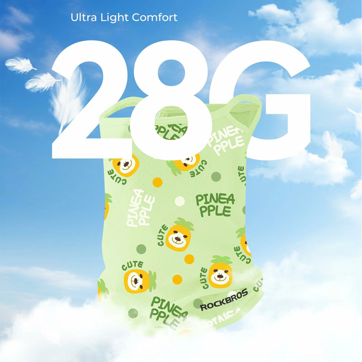 Green mask with pineapple pattern against a blue sky background, featuring the text 'Ultra Light Comfort' and '28G'.