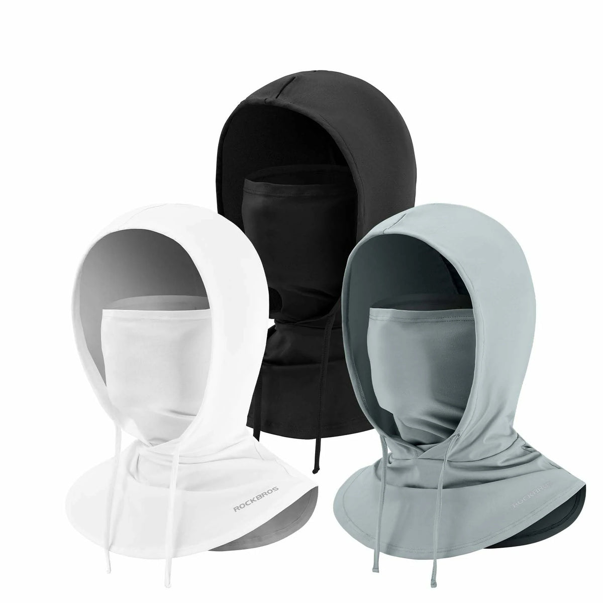 Three masks,black, white, and gray on mannequins against a white background.  #Color_Gray+Black+White
