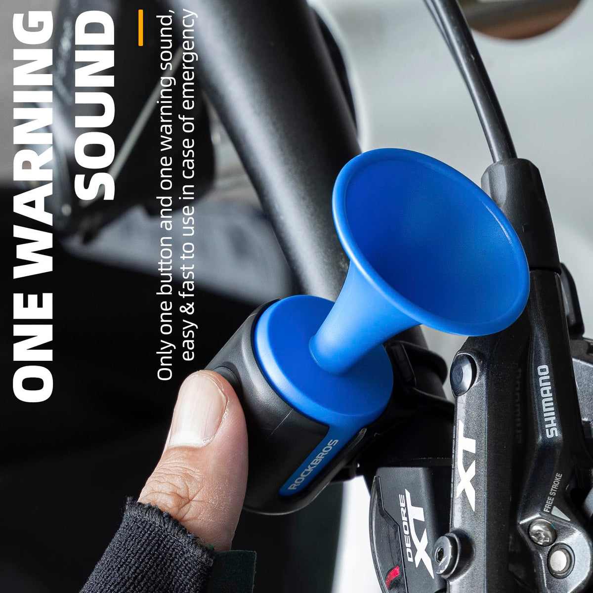Blue bike horn attached to handlebars with text about warning sound and ease of use.