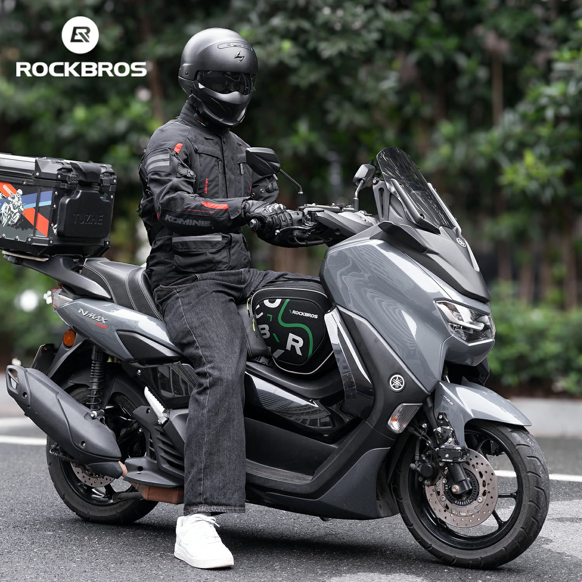 12L motorcycle tank bag with ergonomic fit, double-zip opening, rainproof cover, and reflective safety accents.