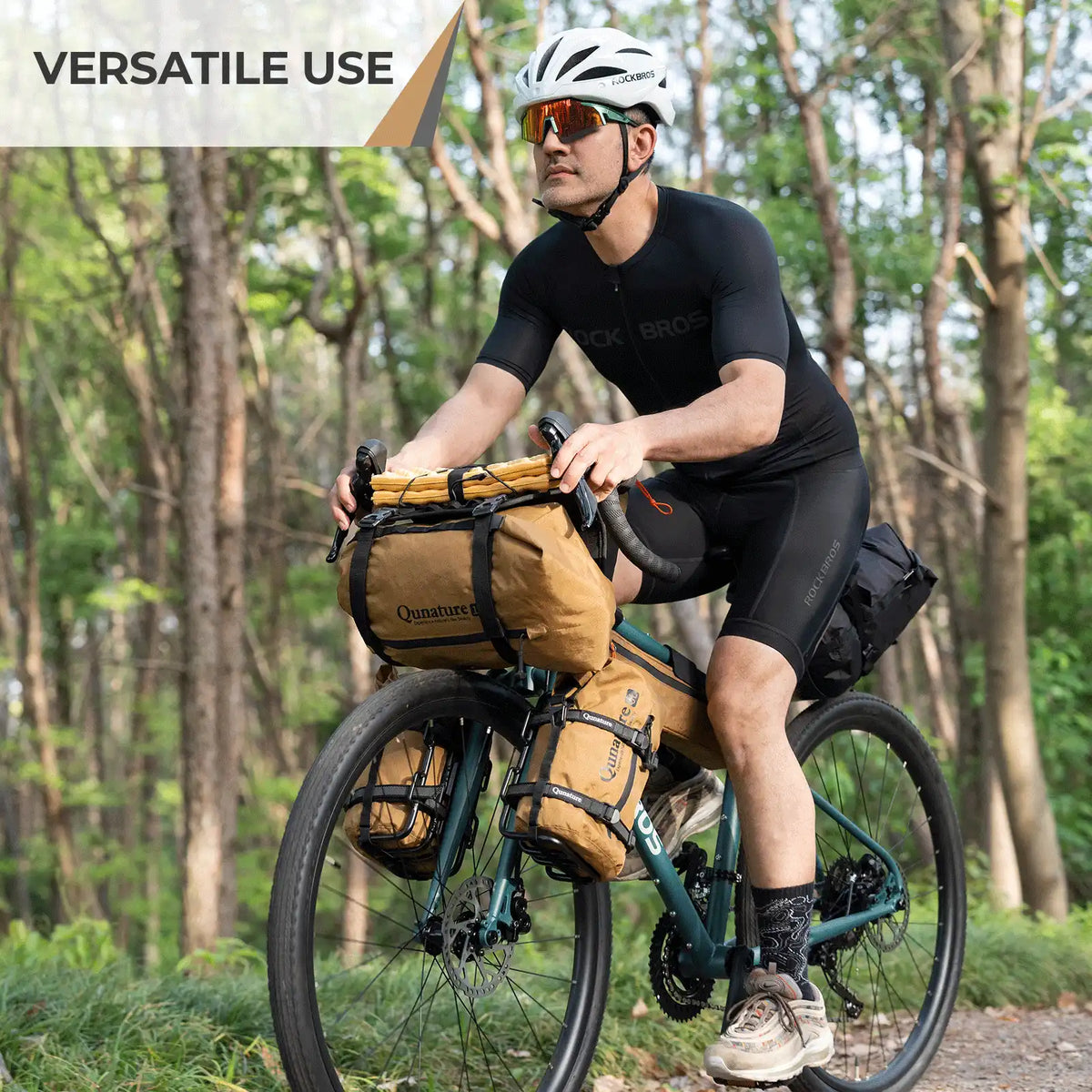 Man riding a bicycle with gear in a forest, highlighting versatile use.
