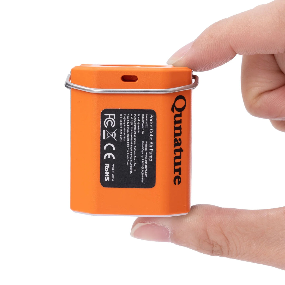 Orange air pump with 'Qunature' branding held by a hand on a white background