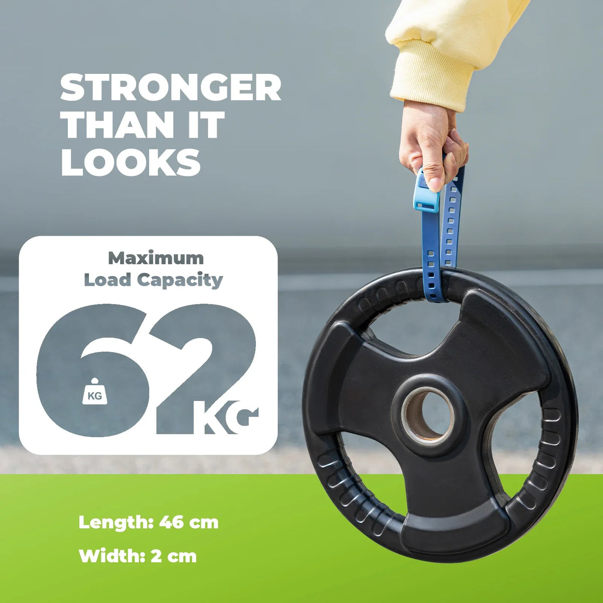 Person holding a weight plate with 'Stronger Than It Looks' text and load capacity information.