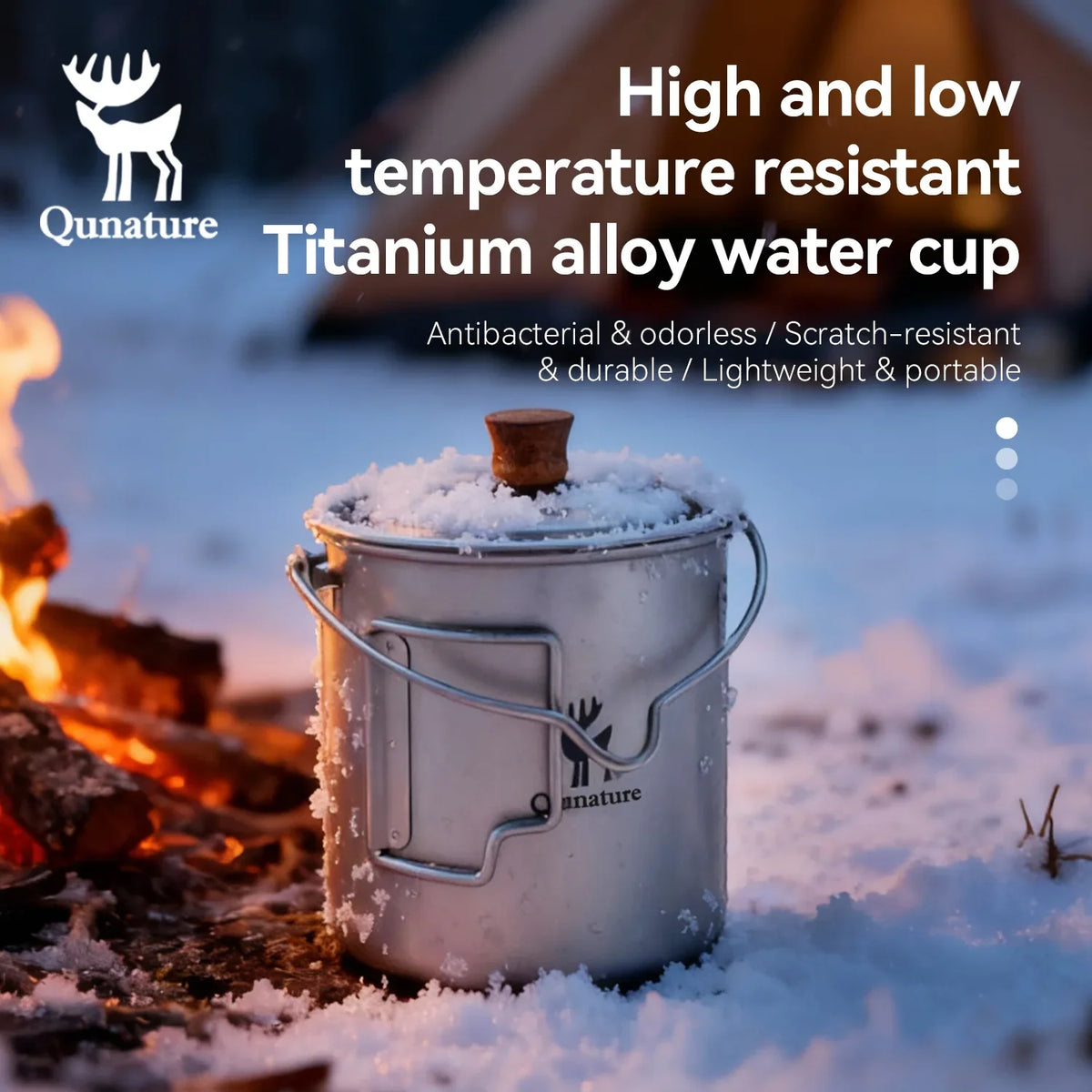 Titanium alloy water cup in the snow with Qunature branding and product features.