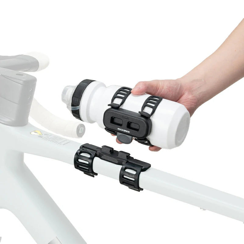 ROCKBROS magnetic strap-type bike water bottle cage, offering secure and quick access with an innovative magnetic attachment system.