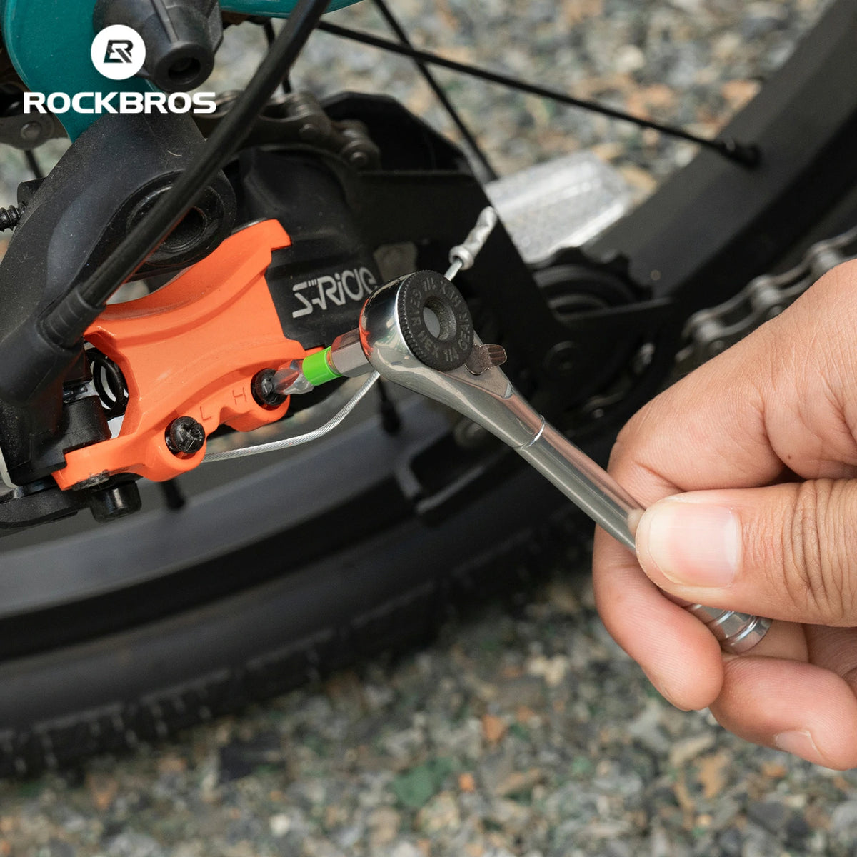 Person adjusting a motorcycle brake lever with a wrench, featuring the RockBros brand.
